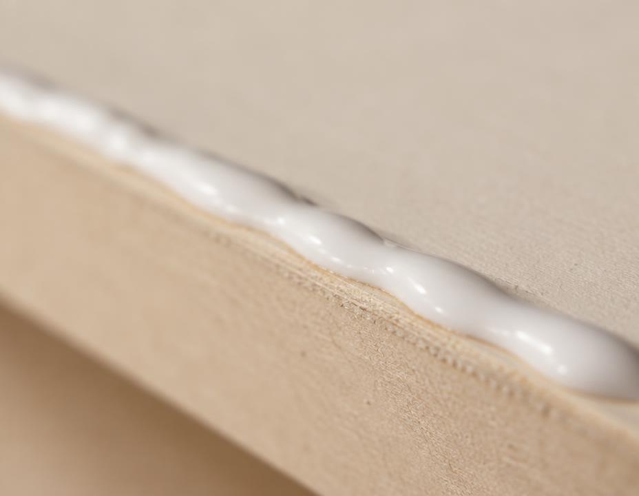 Low-VOC adhesives